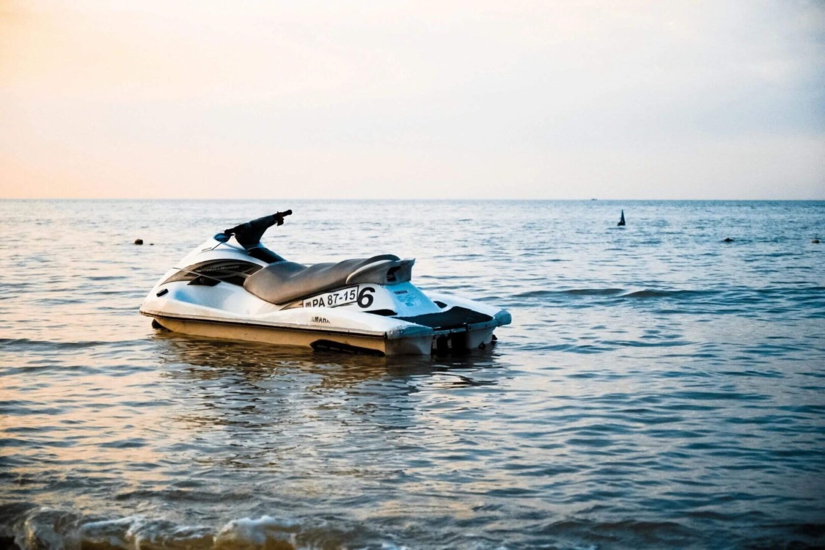 A jet ski is floating on the water.